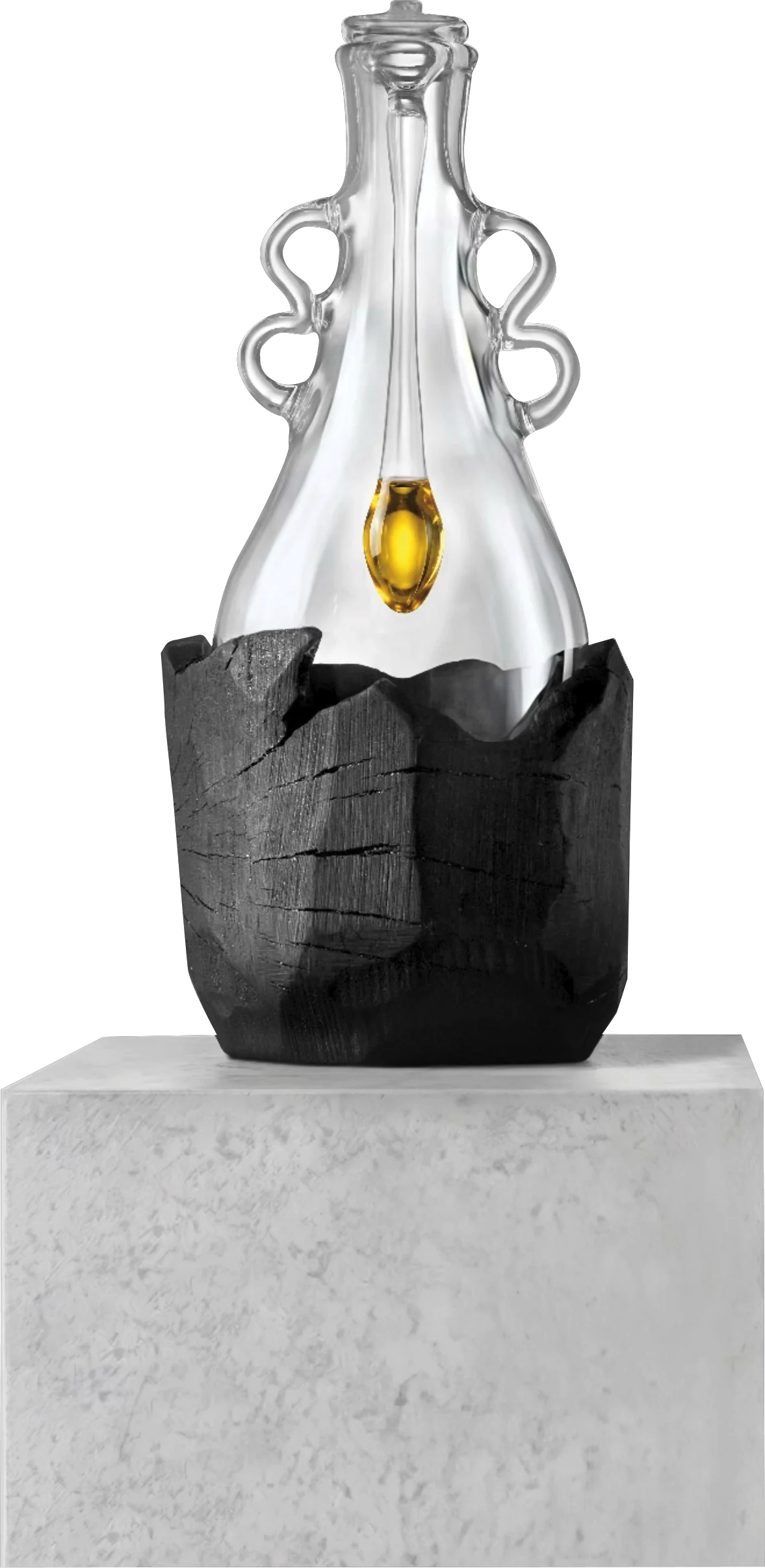 Hand-blown glass vessel holding a seed-shaped vial of olive oil, set in burnt olive wood on a stone plinth